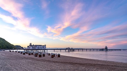 The pier of Sellin, evening mood, sunset, 394 metres long, with restaurant, jetty, beach chairs,