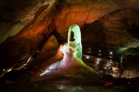 The illuminated Giant Ice Cave, a cave in the Dachstein massif. Obertraun, Salzkammergut, Upper