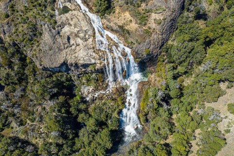 Aerial view of waterfall Cascada El Maqui near Puerto Guadal, Patagonia, Chile, South America