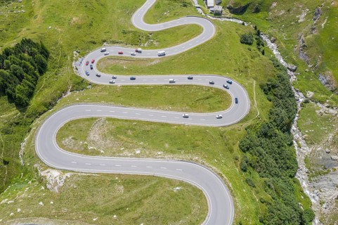 Drone shot, curves of Julier mountain pass, Switzerland, Europe