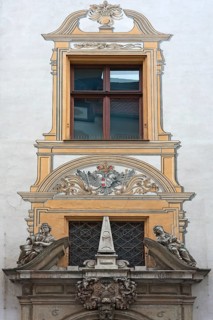 Detailed view of the entrance portal with the Alegories of Faith and Peace of the Baroque Town Hall