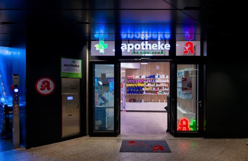 Night shot, pharmacy city centre, logo, subway, escalator, neon light, illuminated, Stuttgart,
