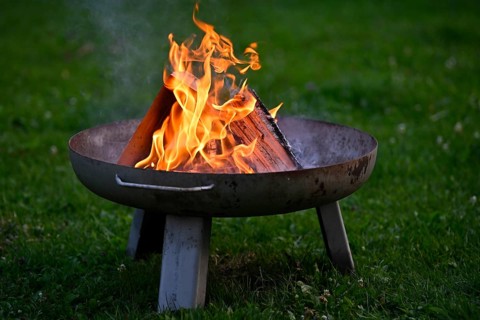 Fire bowl on lawn, in the garden, wood, fire, Stuttgart, Baden-Württemberg, Germany, Europe