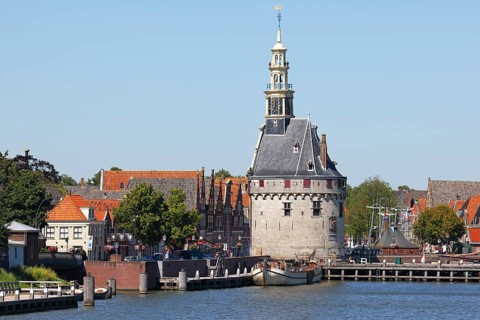 City view of Hoorn from the Markermeer, historic city centre with Hoofdtoren tower, Hoorn, North