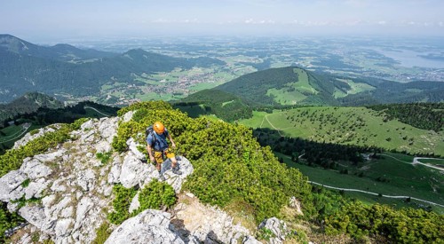 Climber on a climbing tour, climber on a mountain ridge, alpine climbing, crossing the Kampenwand,