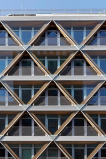 Façade with honeycomb structure, office building The Cradle, innovative timber hybrid building by