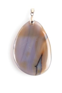 Colored onyx pendant isolated on white background, close up