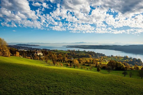 View over Lake Constance in autumn, Spetzgart Castle in front, Alpine chain behind, near