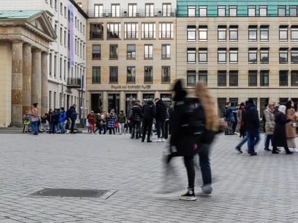 Motion blur, tourists and passers-by at Pariser Platz, Berlin, Germany, Europe