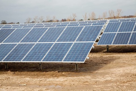 Solar array of photovoltaic panels in a large new solar park at Bucklesham, Suffolk, England,