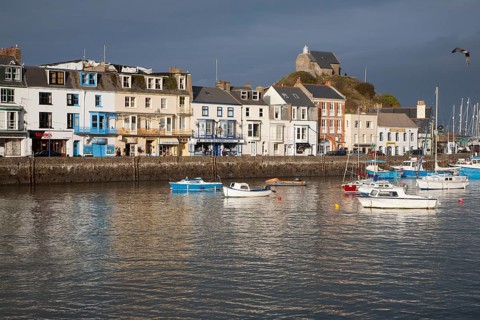 View of boats in the harbour in sunshine of winter afternoon, Ilfracombe, north Devon, England,
