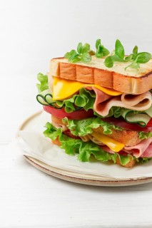 Club sandwich, on a white table, close-up, no people, horizontal, homemade