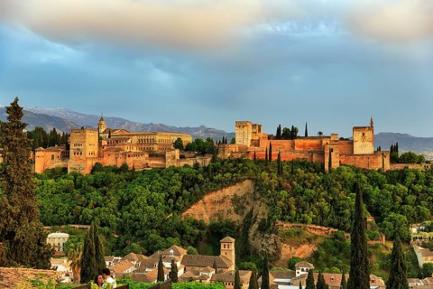 Alhambra on the Sabikah hill at sunset, Moorish city castle, Nasrid palaces, Sierra Nevada with