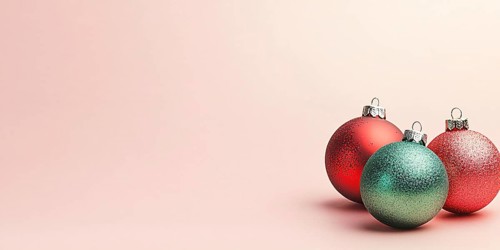 Christmas banner with green and red bauble ornaments on pink background with copy space. Generative