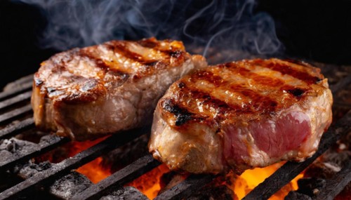 Food, dishes, two pork steaks on a charcoal grill with glowing charcoal, KI generated, AI generated