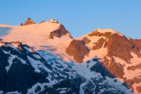 First light hits summit of Hinter Tierberg, Mittler Tierberg and Vorder Tierberg, with