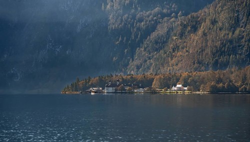 Königssee and pilgrimage church St. Bartholomä, autumnal mountain landscape by the lake,