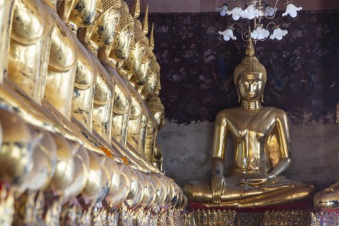 Golden Buddha statues, Bhumispara-mudra, Buddha Gautama at the moment of enlightenment, Wat Suthat