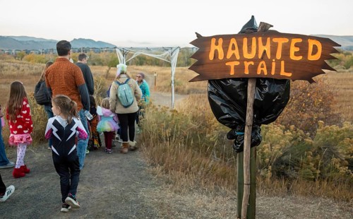 Lakewood, Colorado, Families enjoy the pre-Halloween Haunted Trail event at Bear Creek Lake Park