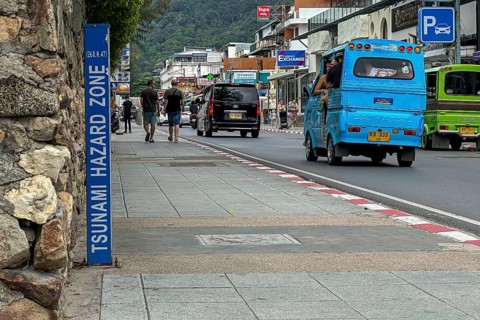 Tsunami Hazard Zone. Warning sign, signposting of escape routes in the event of another seaquake.