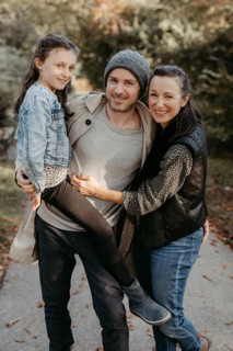 Parents with daughter, family photo