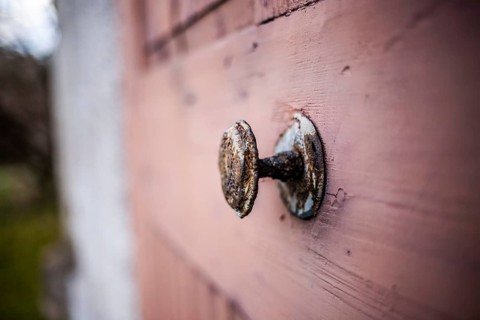 Rusty doorknob, Leoben, Styria, Austria, Europe