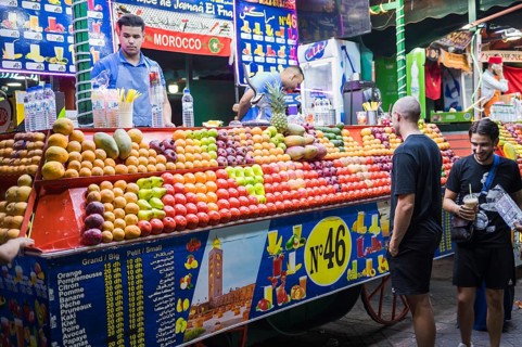 MARRAKESH, MOROCCO - SEPTEMBER 29, 2024: A pile of fruit at square Jemaa el Fna in Marrakesh,