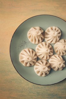 Traditional Georgian dish, Khinkali, Kalakuri, top view, rustic style, no people