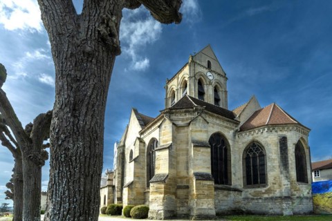 Auvers-sur-Oise. Notre-Dame-de-l'Assomption church painted by Vincent Van Gogh. Val-d'Oise