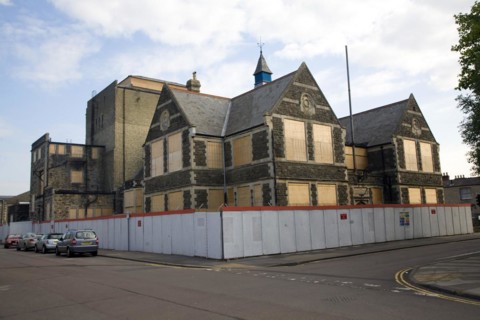 Boarded up Mechanics Institute. The Railway Village built by GWR to house workers in the 1840s,
