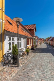 Old town of Rudkøbing, renovated houses, colourful row of houses, dormers, lantern, decorative