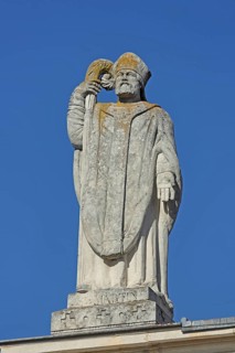 Martin of Tours with crosier on the roof of the church Saint Martin, saint, sculpture, arm, jug,