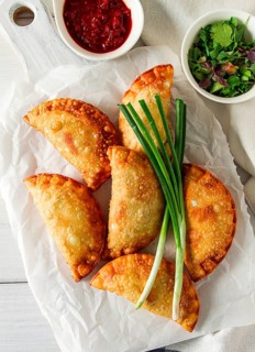 Fried chebureks, close-up, on a light background, no people