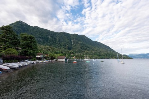 Boats moored on the shore of Lake Maggiore, Castelveccana, Lombardy, Italy, Europe