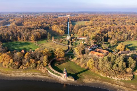 Aerial view of lighthouse and castle Fasanenschloss, view to castle Moritzburg in the back, autumn