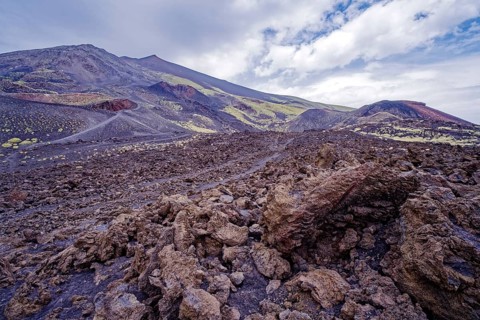 Lava rock and crater landscape around the Crateri Silvestri in the Etna National Park, Parco