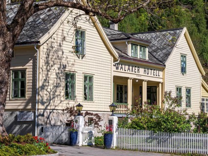 Decorated entrance of the traditional Walaker hotel, village Solvorn at the Sognefjord, Norway,