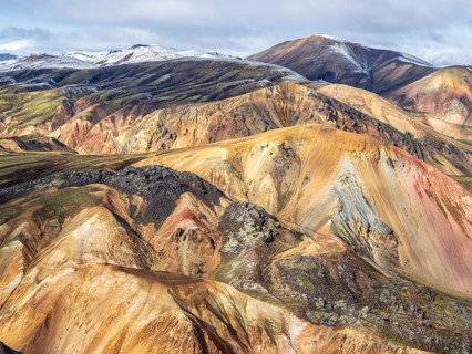 Early snow on the colorful rhyolite mountains, mt. Brennisteinsalda, lava fields, Landmannalaugar,