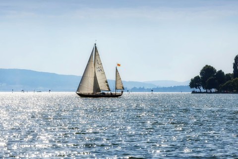 Sailing yacht underway on Lake Constance. Immenstaad, Baden-Württemberg, Germany, Europe