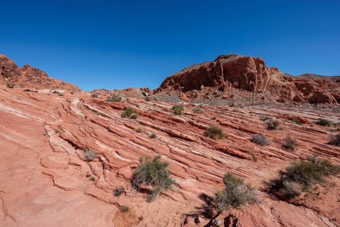 Layered rock formations along the Fire Wave Trail at Valley of Fire State Park near Overton, Nevada