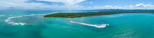 Turquoise sea, aerial view, view of Cahuita National Park, coast and coastal landscape with forest,
