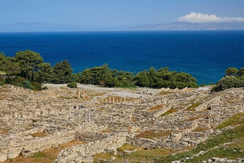 View of the ruins of an ancient historical site by the sea under a cloudy sky, Kamiros,