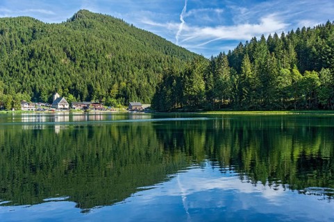 Mountain lake and village Spitzingsee, municipality Schliersee, behind mountain Schwarzenkopf,