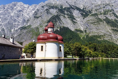 Pilgrimage church St. Bartholomä at Königssee with excursion steamer, Berchtesgaden National Park,