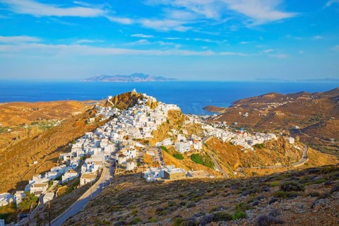View of Chora village and the port of Livadi and Sifnos island in the distance, Chora, Serifos