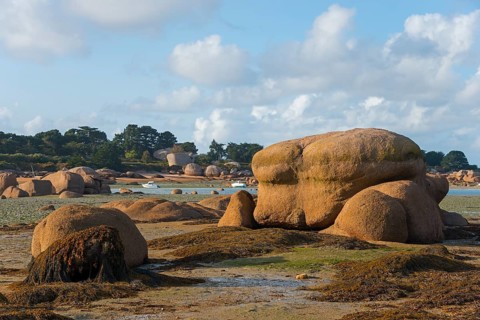 Rocky landscape on the coast under a cloudy sky, Baie de Sainte-Anne, Trégastel, Tregastel, Côte