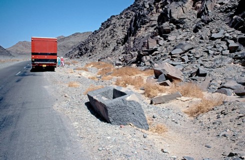 Unfinished, now broken sarcophagus, ancient Egyptian quarry area Wadi Hammamat, Arabian desert,