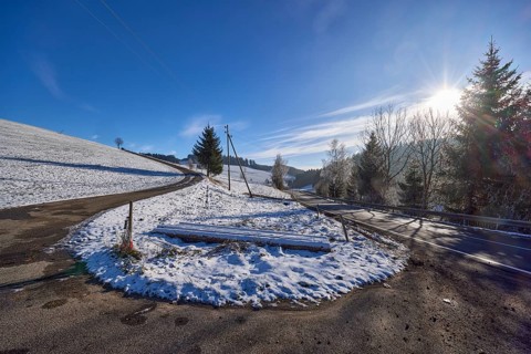Hilly snowy landscape, roads, conifers, blue sky with veil clouds, Jostalstraße, Titisee-Neustadt,