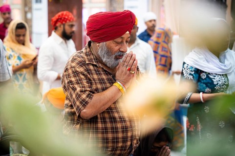 Sikh devotees offer prayers at a Gurudwara on the occasion of Guru Nanak Jayanti, in Guwahati,