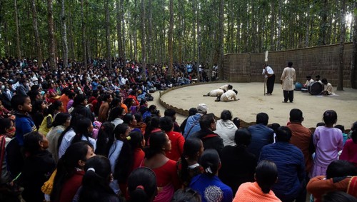 People enjoying a drama during 'Under The Sal Tree' Theatre Festival on December 15, 2021 in